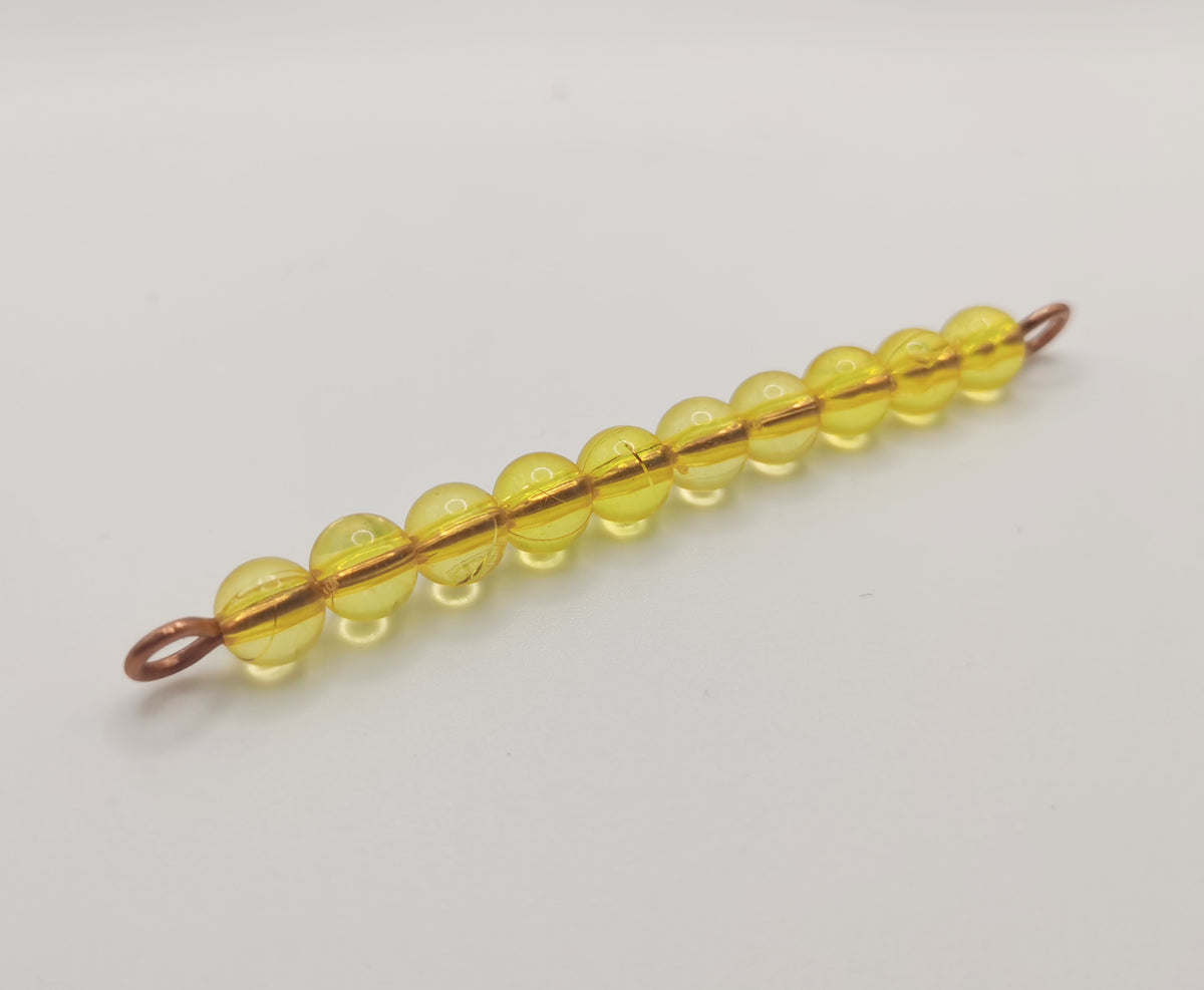 1 barre de 10 perles dorées