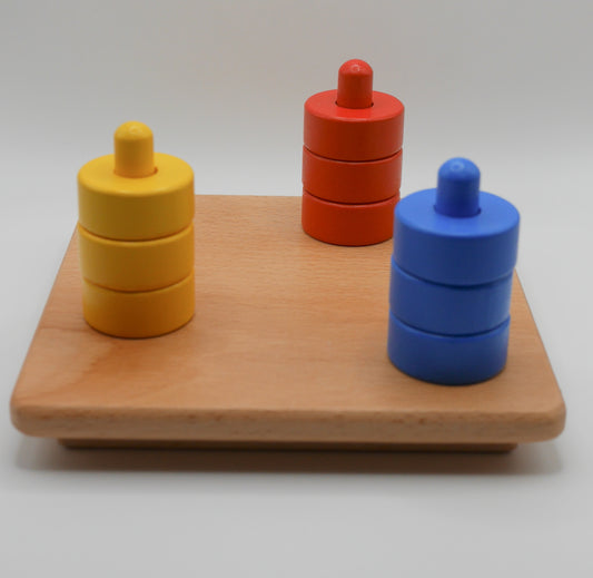 Disques colorés sur 3 tiges